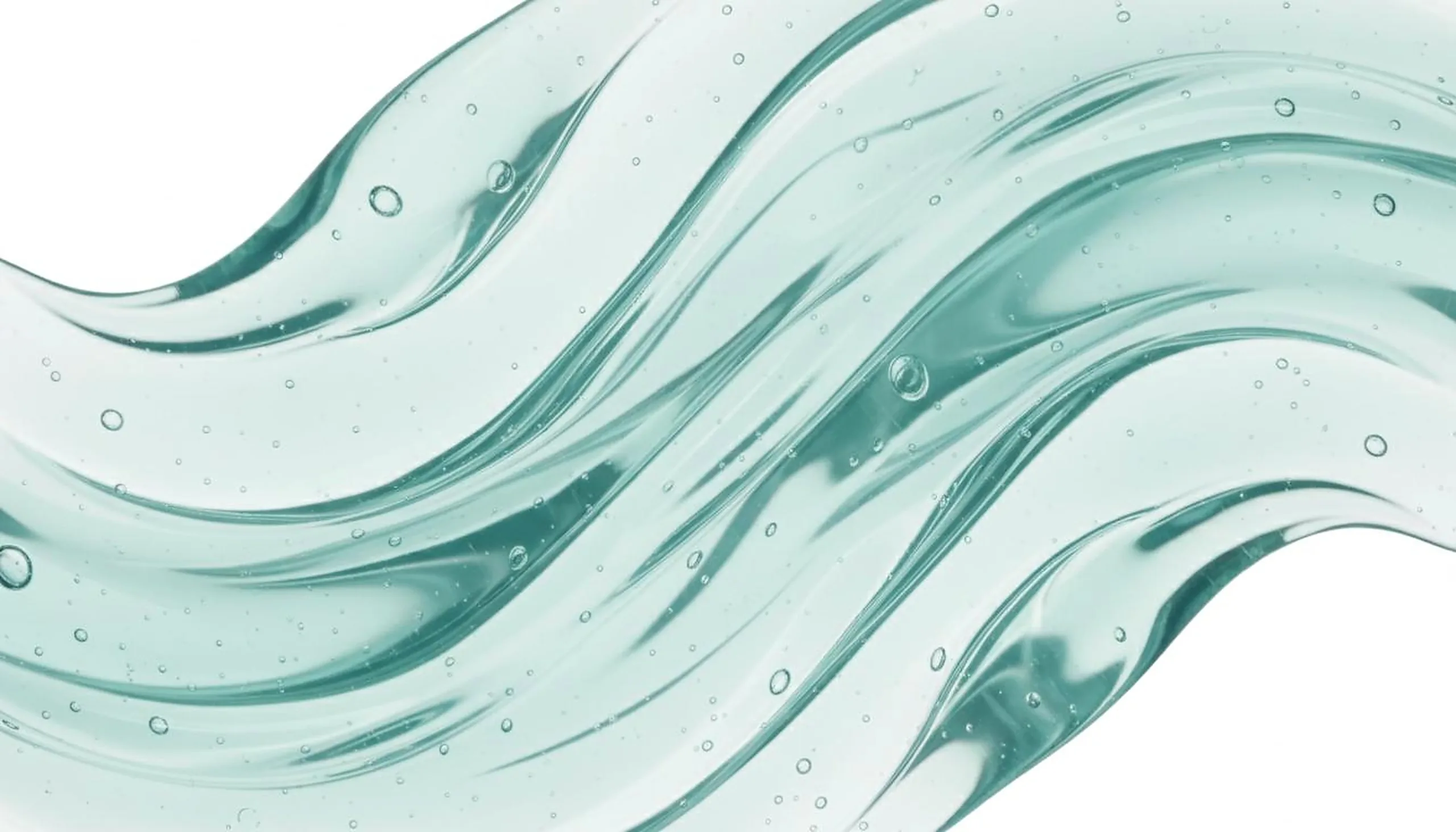 A swirl of clear turquoise gel, magnified